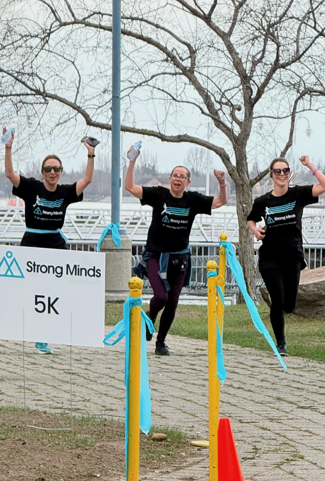 Strong Minds participants celebrating during the Run for Change 5K
